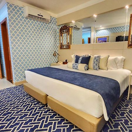 Golden Lis Hotel Boutique 戈亚尼亚 外观 照片 A bedroom at the hotel