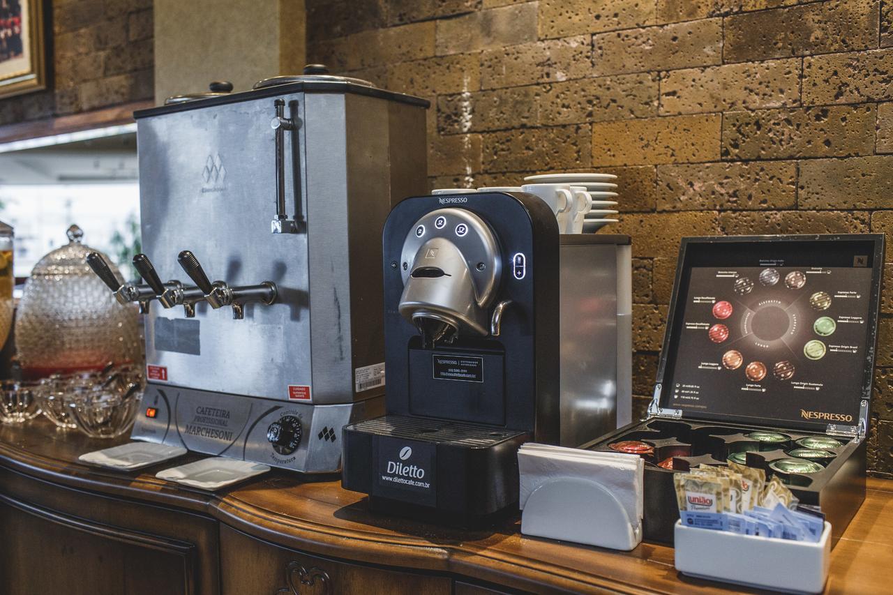 Golden Lis Hotel Boutique 戈亚尼亚 外观 照片 A single serve coffee machine