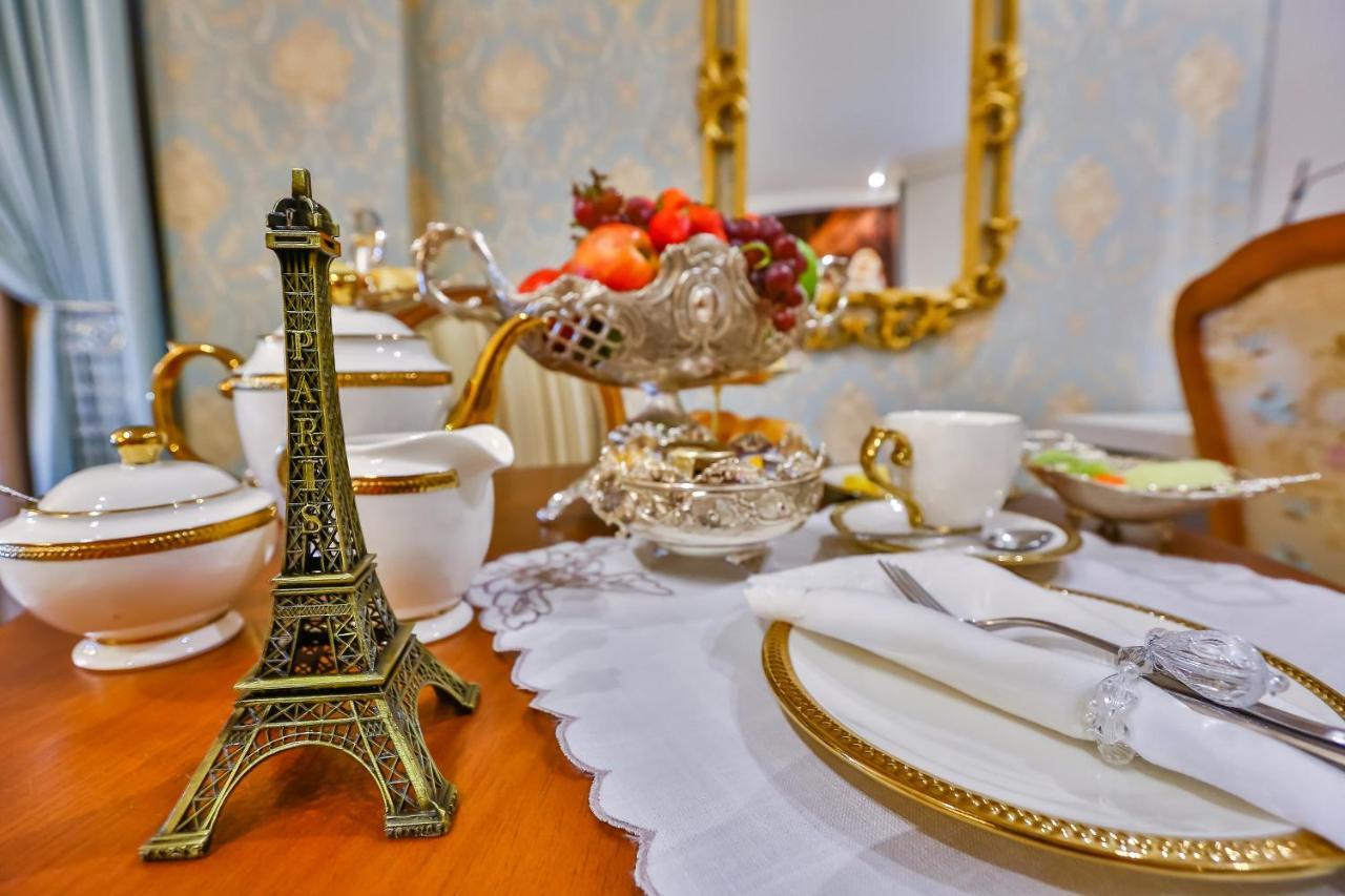 Golden Lis Hotel Boutique 戈亚尼亚 外观 照片 A table set for afternoon tea